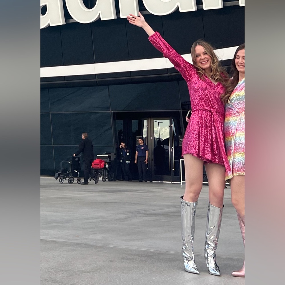 Silver knee high heeled boots